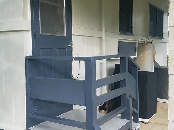 Back patio area where washer & dryer is located