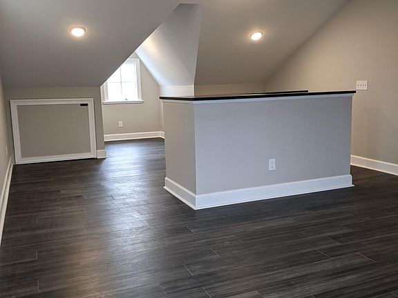 Upstairs loft area has a full closet as well as two extra storage areas.