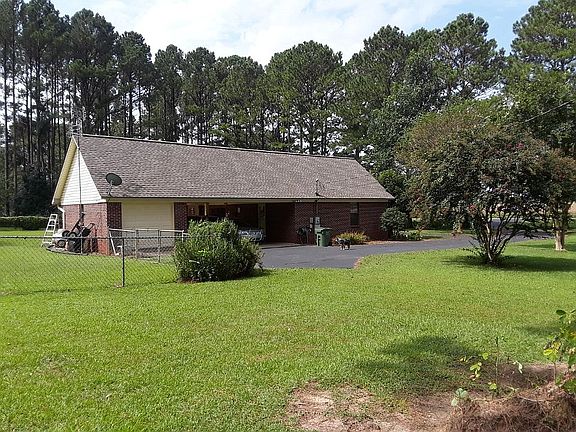 Attached carport and storage
