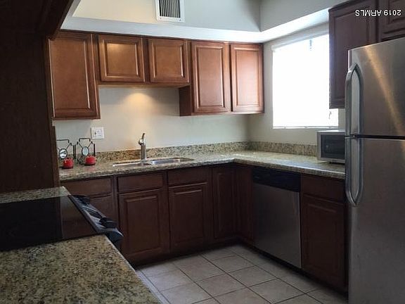 3rd image of 6824 E 2nd St Unit 110