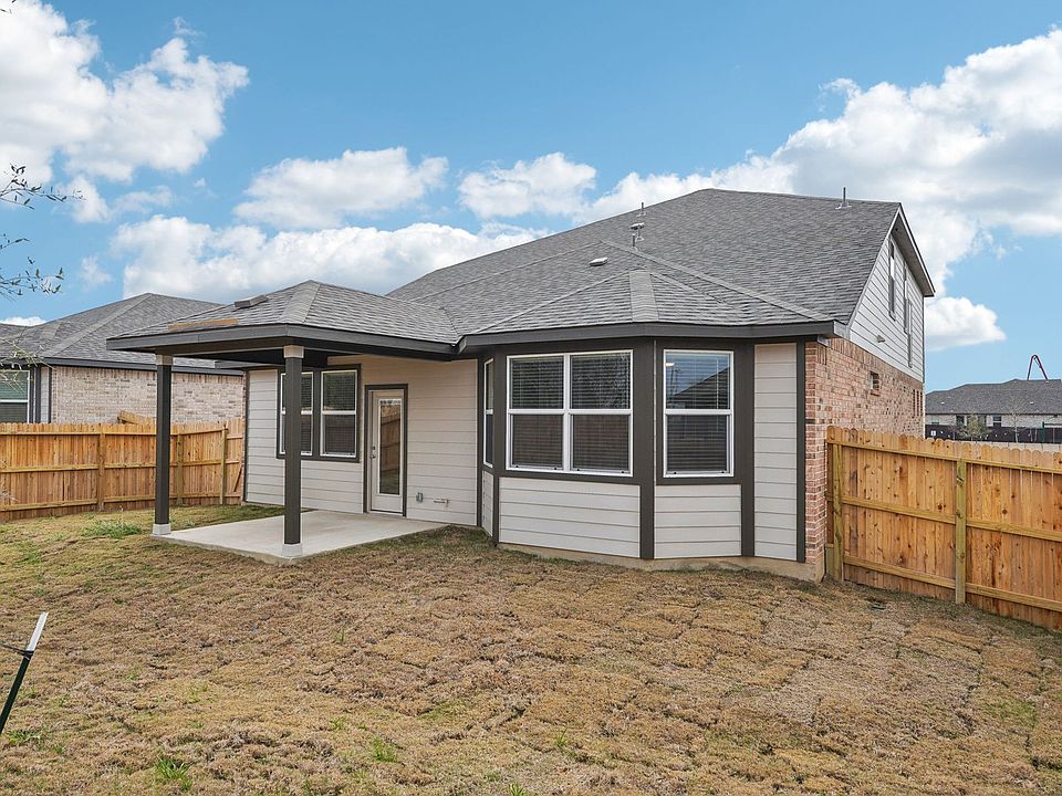 Back exterior of the Sabine floorplan at a Meritage Homes community.