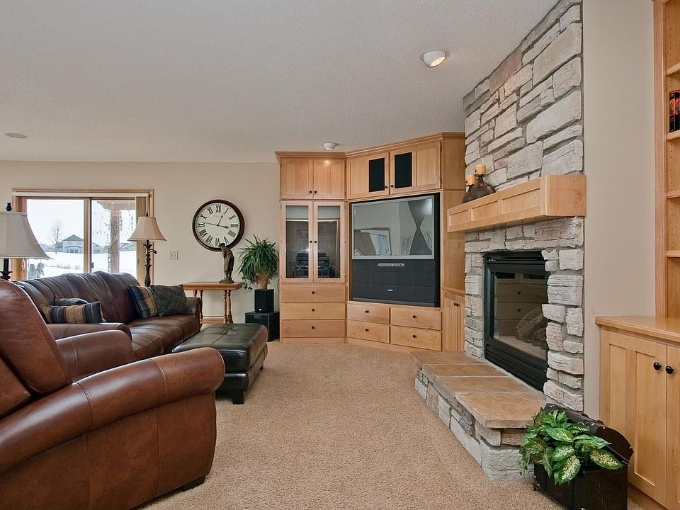 Gas Fireplace & Built In Maple Ent. Center In Family Room
