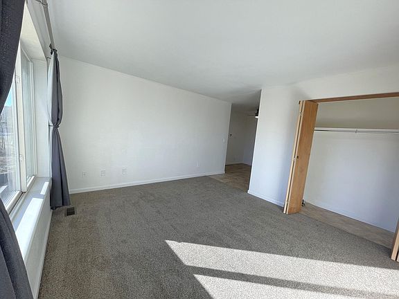 Living room and entry closet