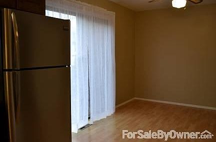 Kitchen dinning area
						:
						WITH NEW DRAPERIES
