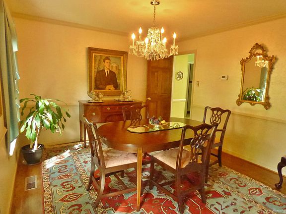 Formal dining room w crystal chandelier