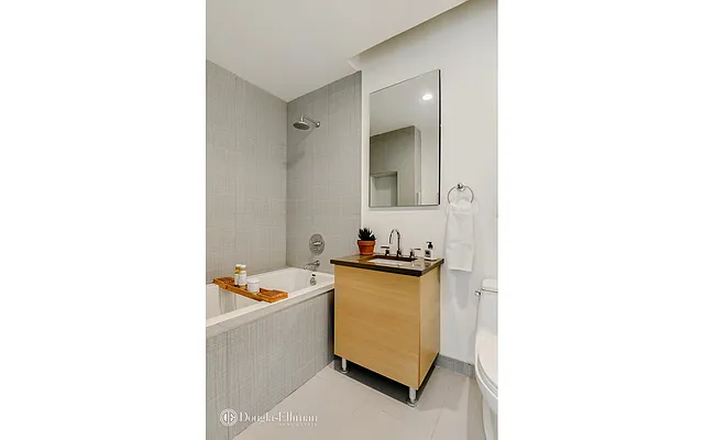 Sold by Douglas Elliman | media 18