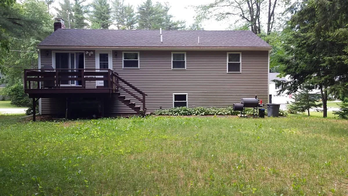 Back of house from back-yard. - Wildwood Ln