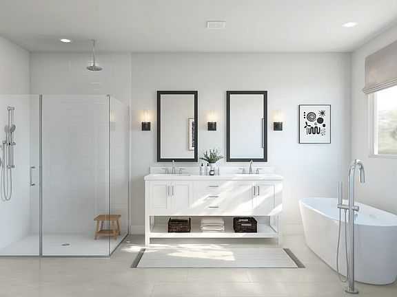 Primary bath with glass shower enclosure and tub