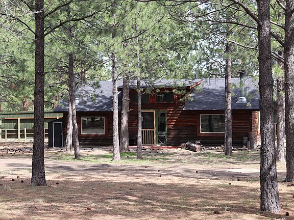 Vintage log updated thru out. Ceramic tile floors, remodeled kitchen and bath. Triple pane gas filled picture windows. Old world charm.