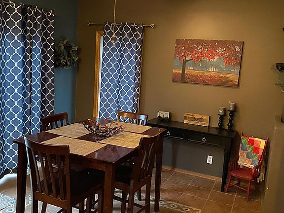 Dining area with custom tile