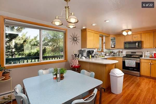 The kitchen has new quartz contertops and sink from this picture.