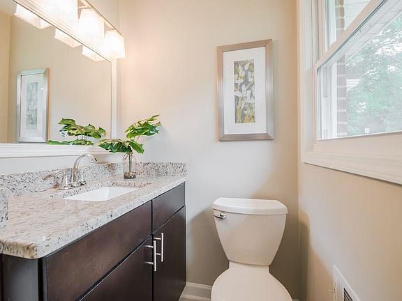 Master bathroom with great natural light! Plenty of space in vanity cabinet.
