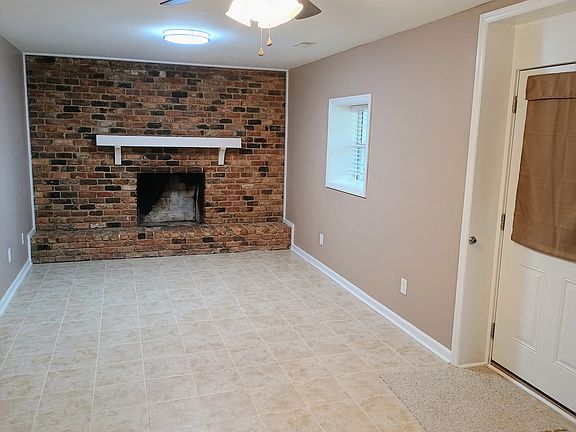 Room adjacent to the kitchen, which can be used as the dining area.