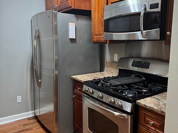 Kitchen with GE Profile stainless steel appliances