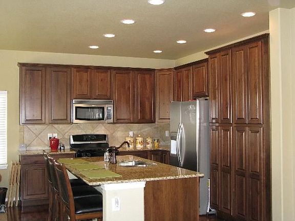 Beautiful grantie counters, 42" cherry wood cabinets, SS appliances/gas range