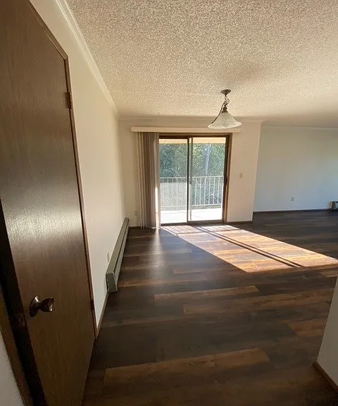 Coat closet to left, dining room with 2nd patio outside of dining room.