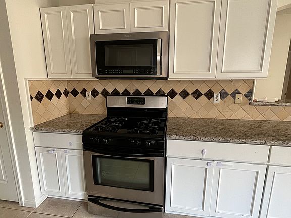Kitchen Gas stove and Microwave
