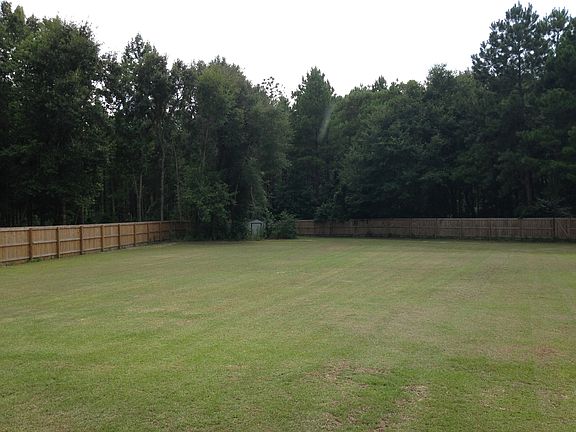 HUGE fenced back yard!
