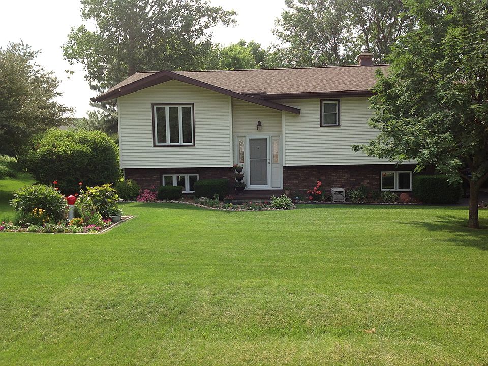New siding, roof, plantings