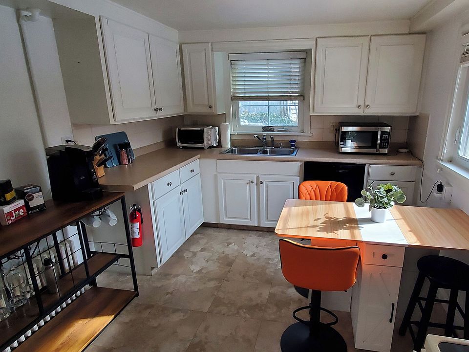 Kitchen includes all appliances (stove, fridge, dishwasher, microwave, toaster oven, blender, and coffee maker)