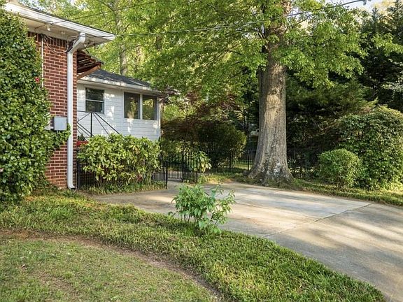 Parking pad with space for two vehicles