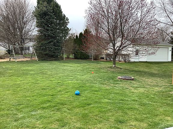 Back yard with garage