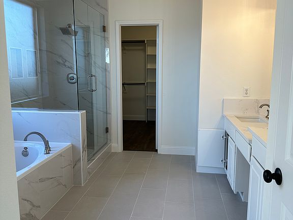 Rejuvenate in master bathroom and large walk in closet.