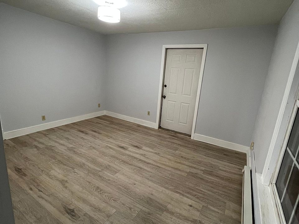 Living room with new flooring and new lighting