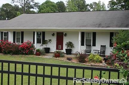 Peaceful large front porch for enjoyment
						:
						Beatifully landscaped for fun, enjoyment and easy maintenance