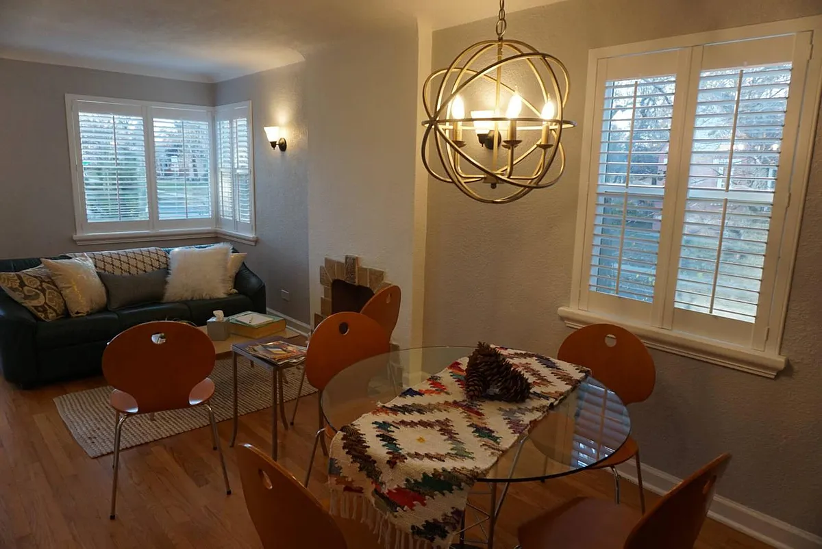 Enjoy natural light with beautiful plantation shutters - 5605 E 14th Ave