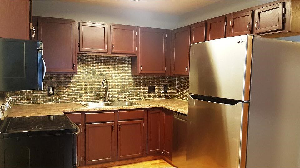 Updated Kitchen hardwood floors.