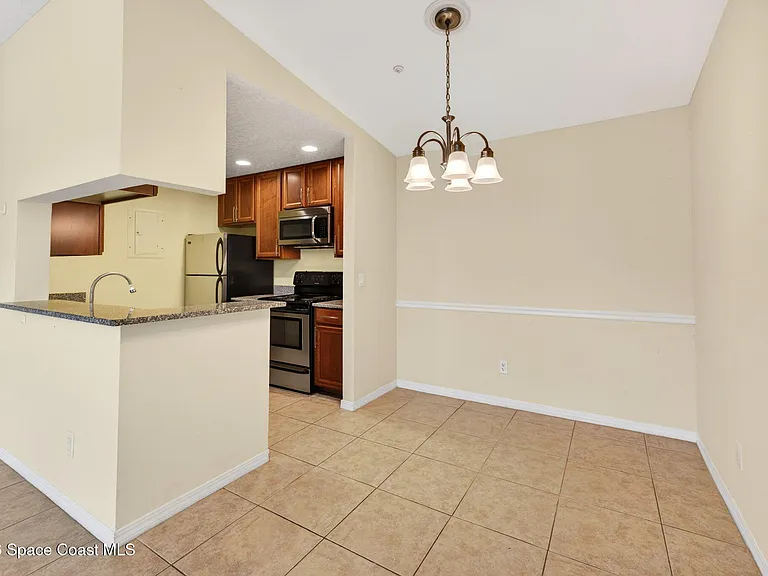 7667 N Wickham Rd #219 — Photo 13