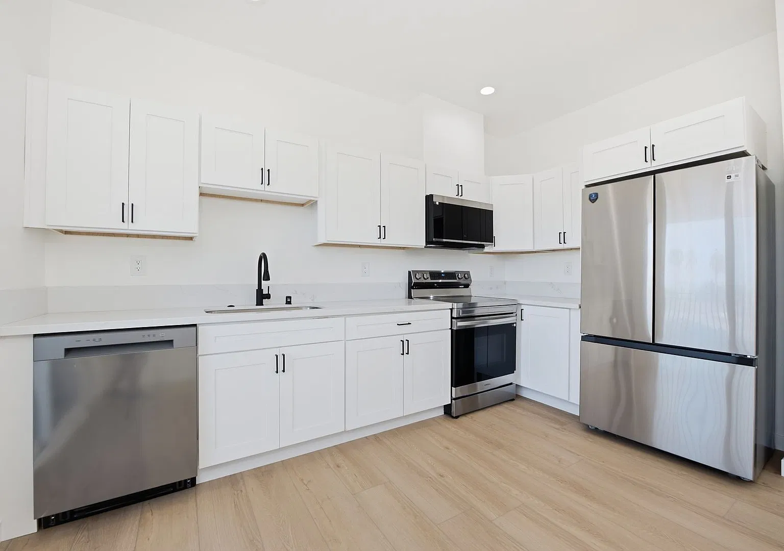 Brand New 3 Bed / 3 Bath with Private Balcony and In-Unit Laundry — Photo 3