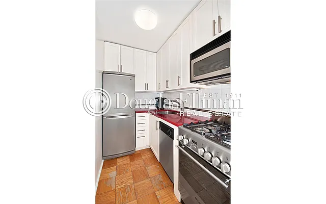 Sold by Douglas Elliman | media 11