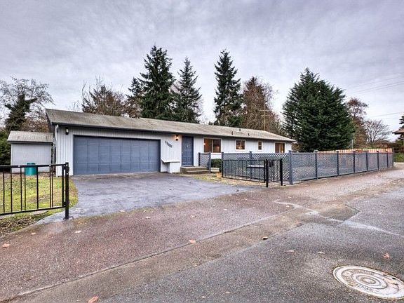 Corner lot on Seola Greenbelt, southern exposure, seasonal filtered Sound view through the greenbelt