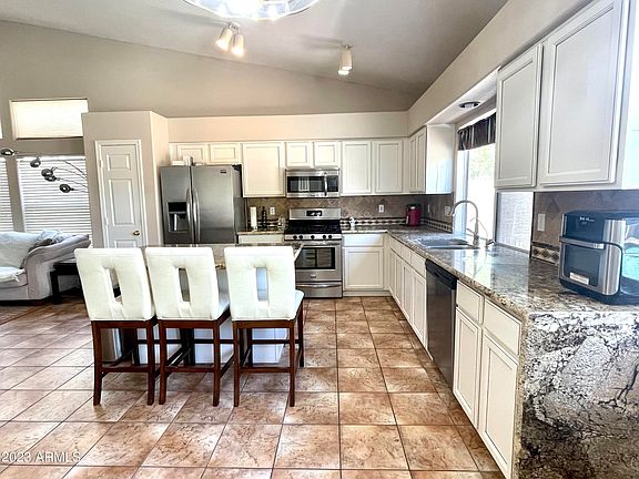 5th image of 3210 W GENOA Way