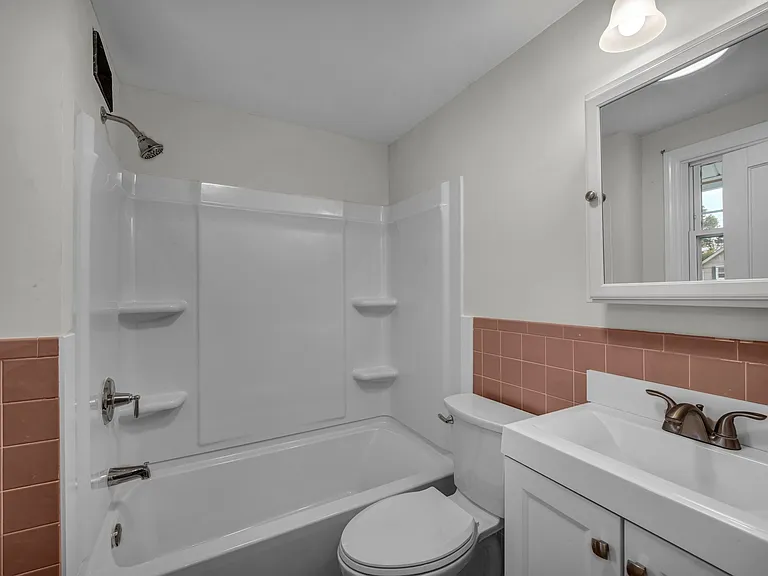 Updated full bath. New tub/shower, toilet, vanity.
