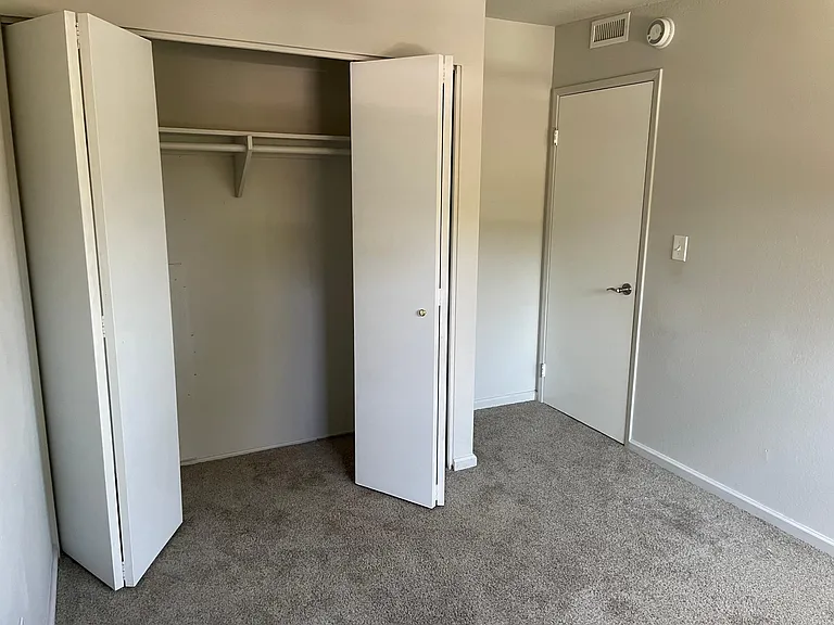 One of two other bedrooms upstairs, 9.5 ft x 10 ft and 8.7 ft x 10 ft.