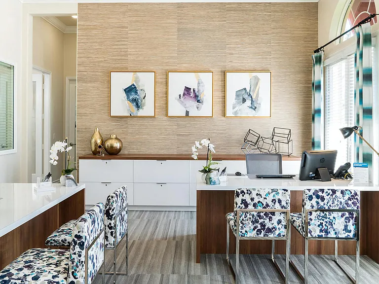 Leasing Center With Coordinated Decor and Private Desks