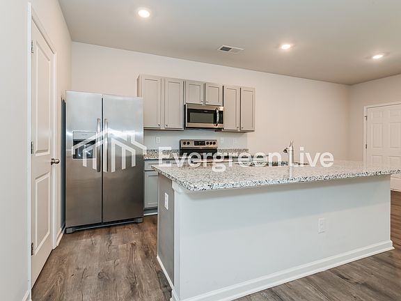 3rd image of 112 Village Green Dr