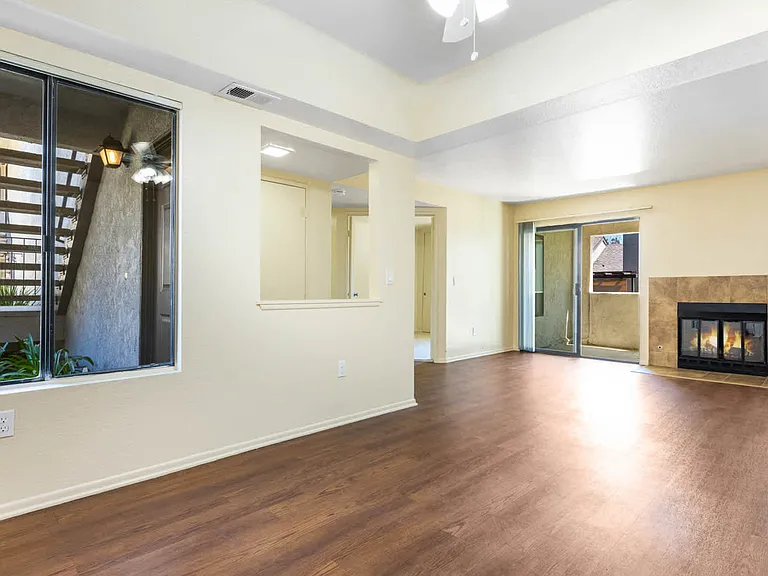Living Room with Balcony and Fireplace