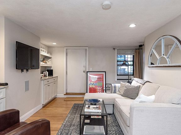 Spacious living room with custom built ins