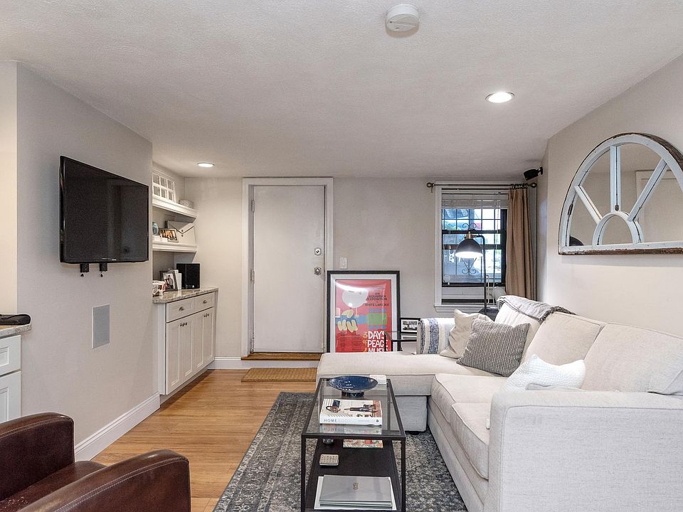 Spacious living room with custom built ins