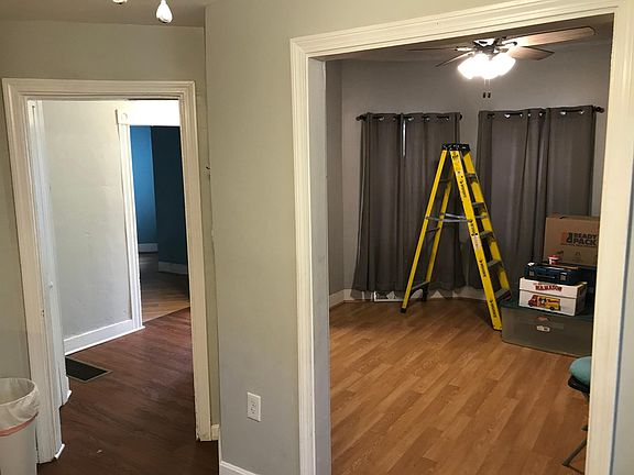 Entry way showing Bedroom 1 and Living room off front door