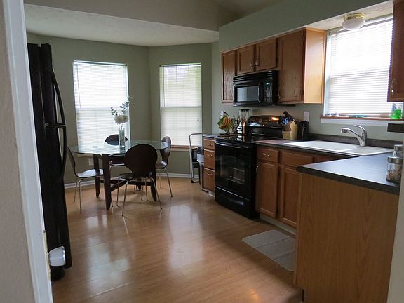 4th image of 9856 River Oak Ln N