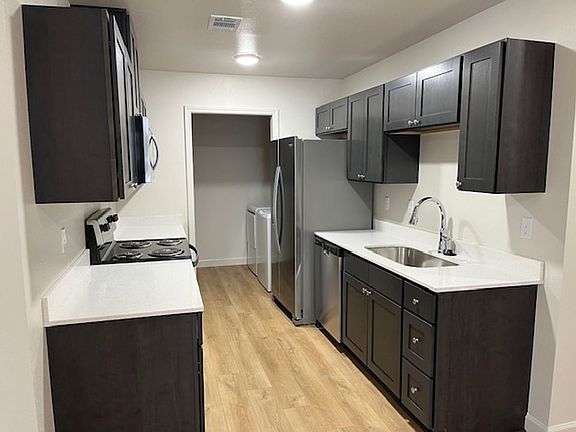 3rd image of 321 E 5th St