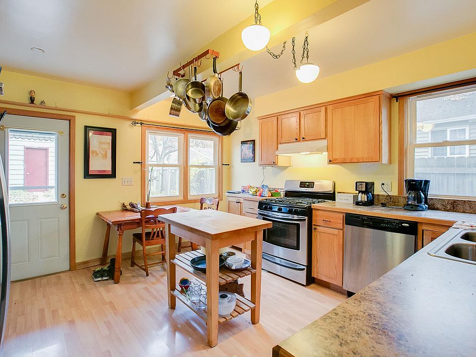 Kitchen is spacious, welcoming, and very bright!