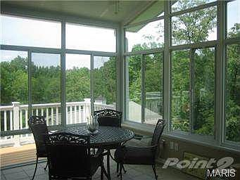 4-season room! Great view of private, wooded acreage!