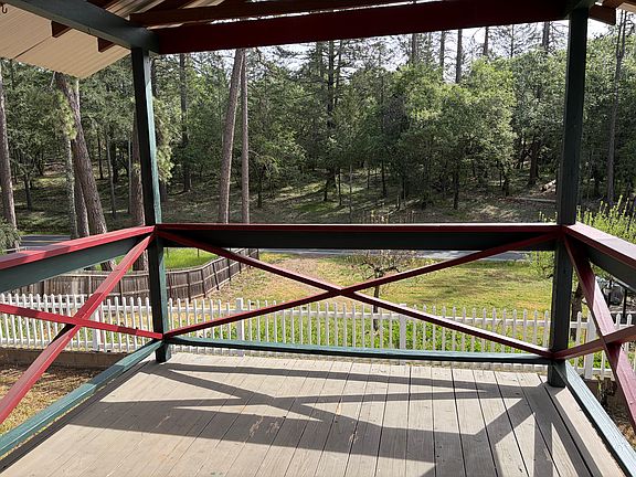 Looking out from front door over porch and beyond