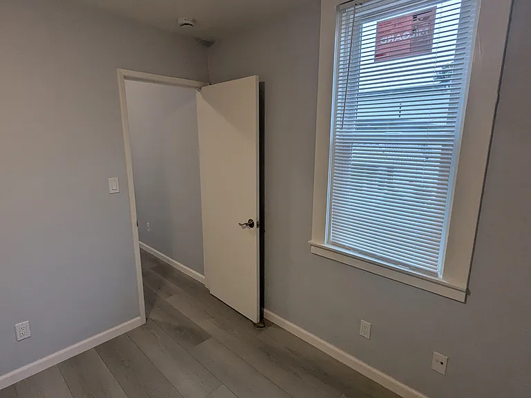 Bedroom looking into office area.
